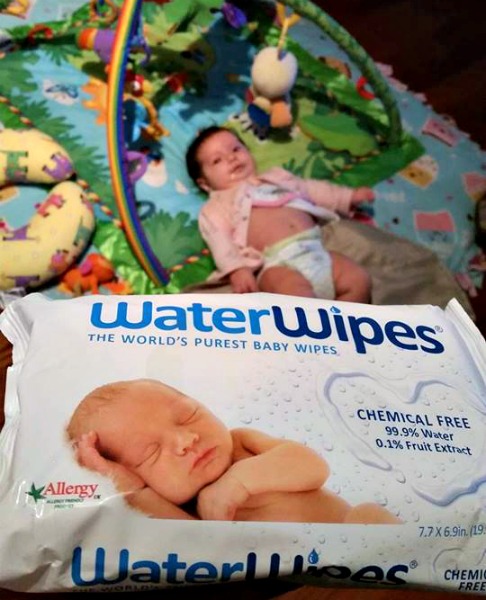 Changing baby with WaterWipes