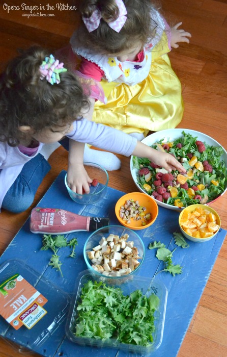 Kids making Chicken Raspberry Kale Salad