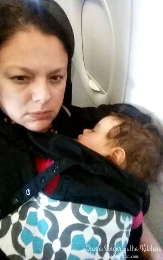 Tired and babywearing on the plane
