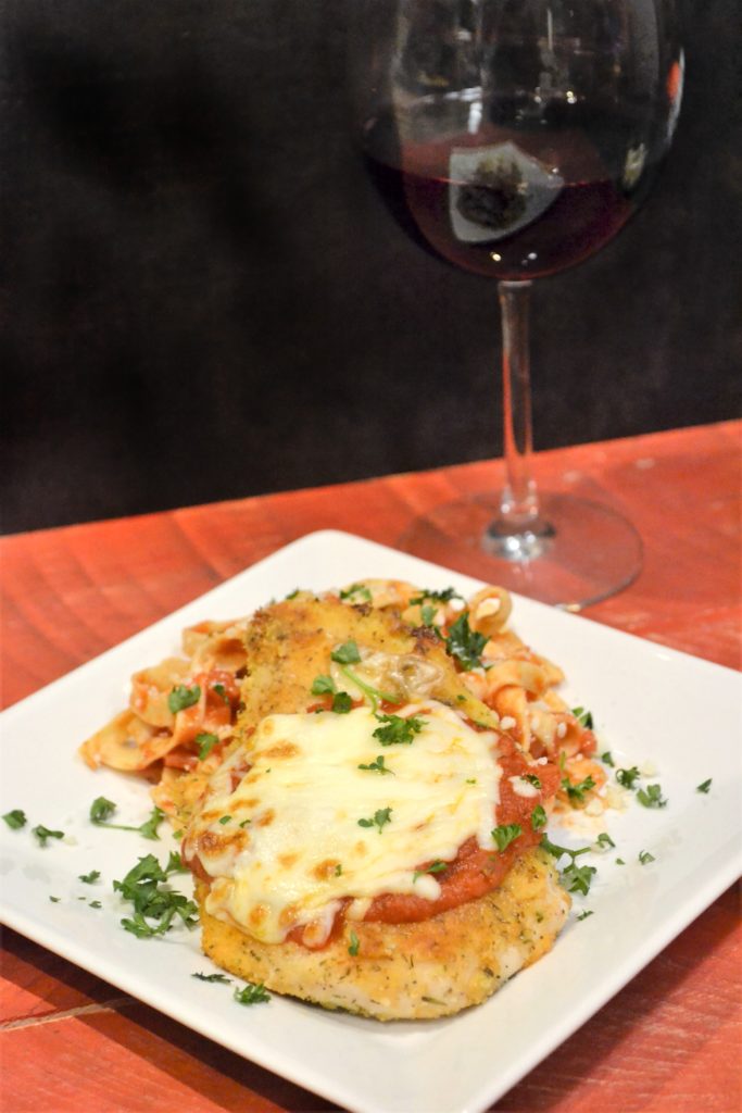 Baked Chicken Parmesan with Cucina Antica Garlic Marinara Sauce and wine