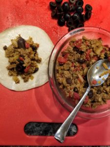 Filling Empanadas with Meat