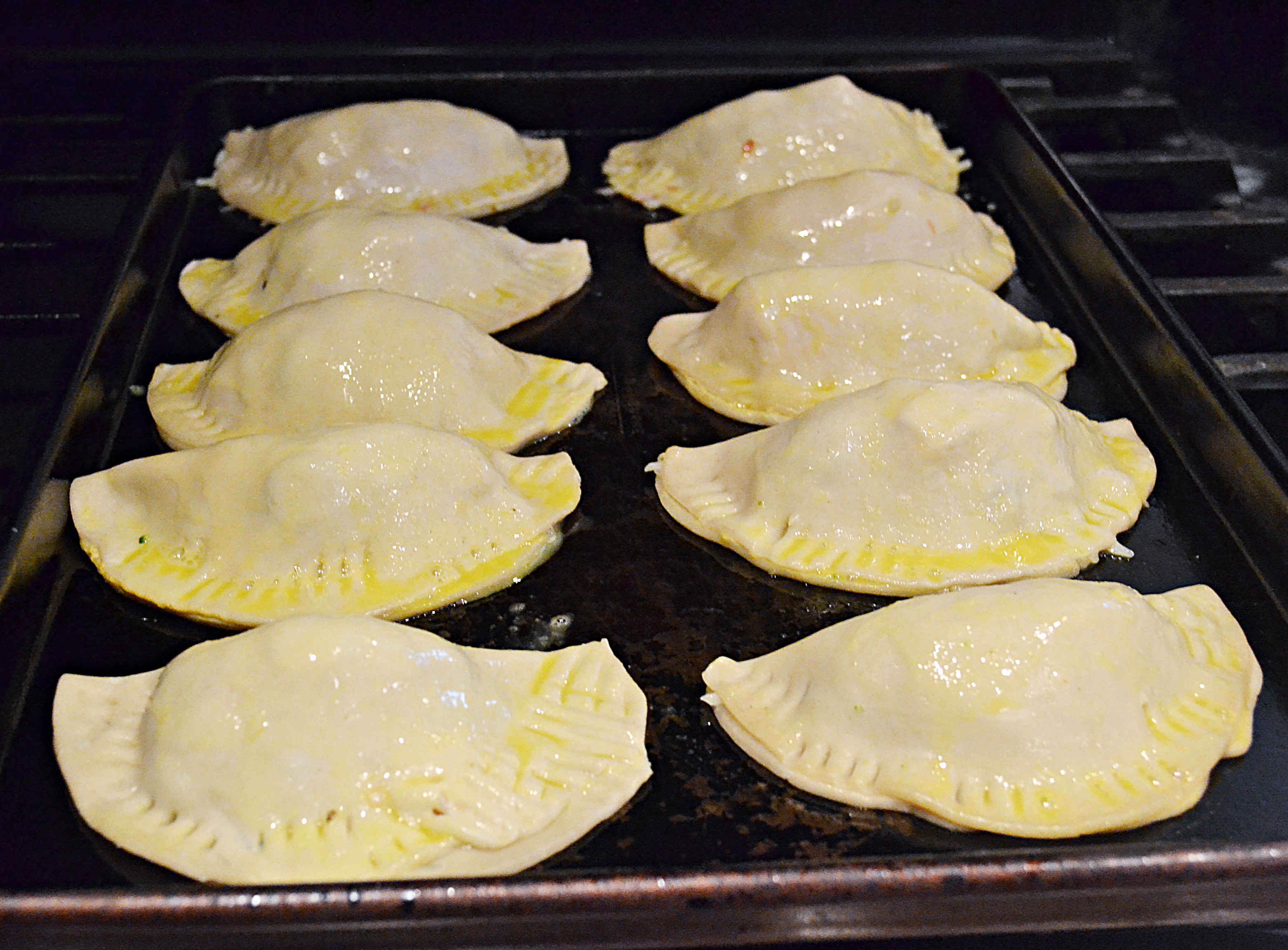 Baked Turkey and Cheese Empanadas - in the oven